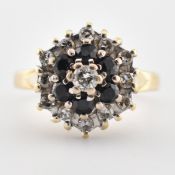 18CT GOLD SAPPHIRE & DIAMOND CLUSTER RING