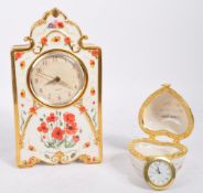 PAIR OF VINTAGE RBLI PORCELAIN CLOCKS BY MARGARET STEVENS