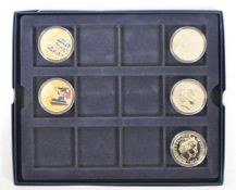 A COLLECTION OF UNCIRCULATED GUERNESY £5 & £0.50P COINS