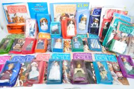 COLLECTION OF PORCELAIN DOLLS & ACCESSORIES BY DEAGOSTINI