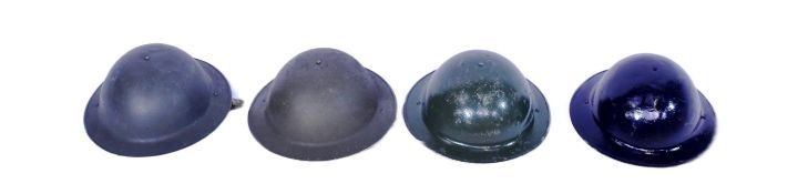 COLLECTION OF SECOND WORLD WAR BRITISH BRODIE HELMETS