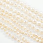 TWO STRINGS OF CULTURED BAROQUE PEARLS