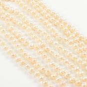 TWO STRING OF CULTURED BAROQUE PEARLS