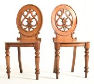 PAIR OF VICTORIAN CARVED OAK HALL CHAIRS