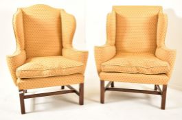 PAIR OF GEORGE III REVIVAL UPHOLSTERED WINGBACK ARMCHAIRS