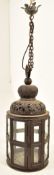 MOROCCAN INSPIRED OCTAGONAL PIERCED METAL & GLAZED LANTERN