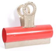 AN ORIGINAL 1980S OVERSIZED PAPERCLIP IN A RED AND NATURAL FINISH