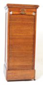 EARLY 20TH CENTURY OAK TAMBOUR FRONTED STATIONARY CABINET