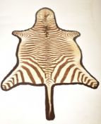 20TH CENTURY TAXIDERMY ZEBRA SKIN HIDE RUG / HANGING