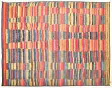 LATE 20TH CENTURY MULTI COLOURED WOOLLEN RUG