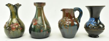ELTONWARE POTTERY, CLEVEDON - FOUR GLAZED SHAPED VASES