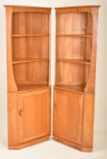 ERCOL - WINDSOR MODEL - PAIR OF ELM CORNER CABINETS