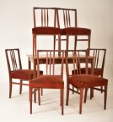 EUROPA & RUSSELL - MID TEAK DINING TABLE AND SIX CHAIRS