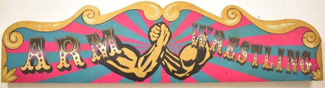 ARM WRESTLING - 20TH CENTURY FAIRGROUND PAINTED SIGN