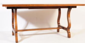 20TH CENTURY YOUNGERS TOLEDO OAK DINING TABLE
