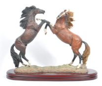 LARGE RESIN FIGURE OF TWO REARING HORSES