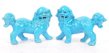 PAIR OF ORIENTAL 20TH CENTURY BLUE GLAZED CERAMIC FOO DOGS
