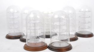 SEVEN 20TH CENTURY CIRCULAR GLASS & PLASTIC DISPLAY DOMES