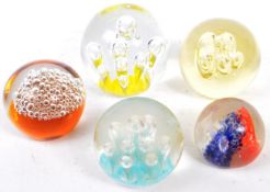 FIVE VINTAGE CONTROLLED BUBBLE STUDIO ART GLASS PAPERWEIGHTS