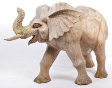 LARGE 20TH CENTURY CARVED ELEPHANT DECORATION