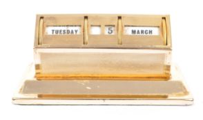 MID 20TH CENTURY GILT METAL PERPETUAL CALENDAR