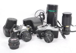 COLLECTION OF JAPANESE SLR CAMERAS WITH LENSES