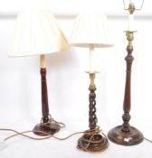 TWO 20TH CENTURY WOOD AND BRASS TABLE LAMPS