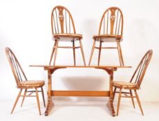 MID 20TH CENTURY ERCOL BEECH AND ELM TABLE AND CHAIRS