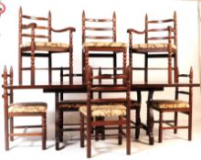 1970S YOUNGER EXTENDING DINING TABLE WITH EIGHT MATCHING CHAIRS