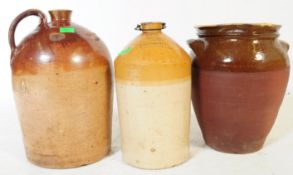 EARLY 20TH CENTURY STONEWARE TREACLE GLAZE FLAGON