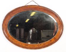 EARLY 20TH CENTURY MAHOGANY OVAL WALL MIRROR