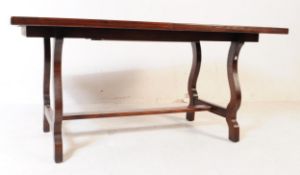 1970S YOUNGER EXTENDING DINING TABLE WITH EIGHT MATCHING CHAIRS