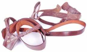 TWO BRITISH MILITARY SAM BROWNE BELTS