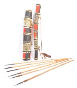 EARLY 20TH CENTURY INDONESIAN TRIBAL QUIVERS AND SIX ARROWS
