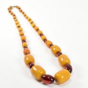 20TH CENTURY YELLOW & CHERRY BAKELITE BEAD NECKLACE
