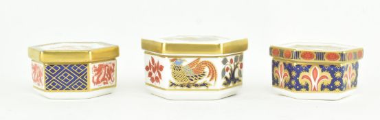 COLLECTION OF THREE ROYAL CROWN DERBY LIDDED TRINKET BOXES