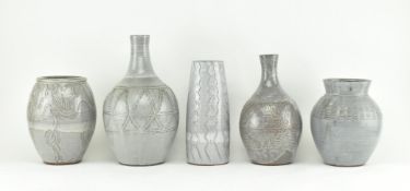 FIVE PIECES OF SLIPWARE STUDIO POTTERY IN GREY GLAZE