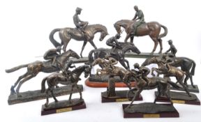 COLLECTION OF BRONZE EFFECT RACING HORSE & RIDERS FIGURES