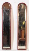 PAIR OF 1920S ELONGATED ARCHED WALL MIRRORS
