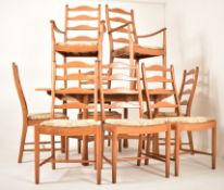 ERCOL - SAVILLE - EXTENDING DINING TABLE AND EIGHT CHAIRS