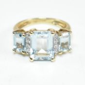 HALLMARKED 9CT GOLD AQUAMARINE & DIAMOND TRILOGY RING