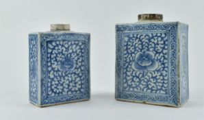 TWO QING DYNASTY BLUE AND WHITE TEA CADDIES 清 青花花卉茶叶罐