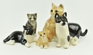 FIVE WINSTANLEY CERAMIC CATS WITH GLASS EYES