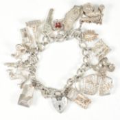 HALLMARKED SILVER CHARM BRACELET WITH HEART PADLOCK CLASP