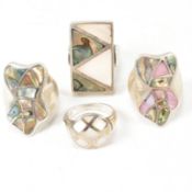 FOUR SILVER MOTHER OF PEARL & ABALONE RINGS