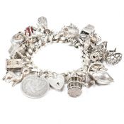 HALLMARKED SILVER CHARM BRACELET