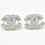 PAIR OF SILVER & CZ DESIGNER STYLE STUD EARRINGS