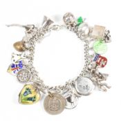 SILVER CHARM BRACELET WITH SILVER & WHITE METAL CHARMS