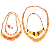 FOUR AMBER BEADED NECKLACES & AMBER JEWELLERY FRAGMENTS