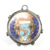 MOUNTED 1897 THREE SHILLING COIN WITH ENAMEL DECORATION